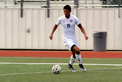 Andrew Beard moves the ball forward on the Jan. 4 game. 