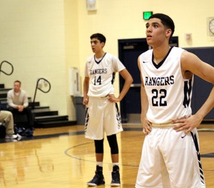 Brotherly Buckets: Alex Peavy waits as his brother Tyler Peavy gets ready to shoot a free throw on Feb. 5 against Clemens at a home game.