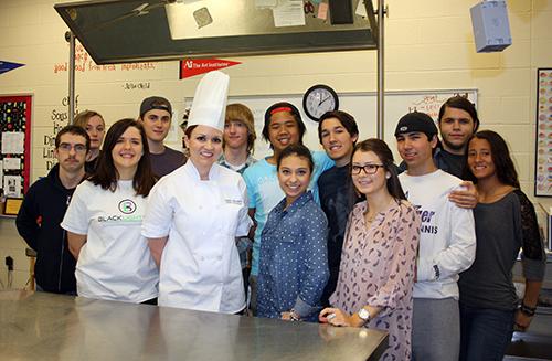 Teacher of the Year, Chef Lauren DeLoach, poses with her fourth period class on March 4.