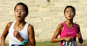 Chasing the spotlight: Sisters set fast pace in cross country