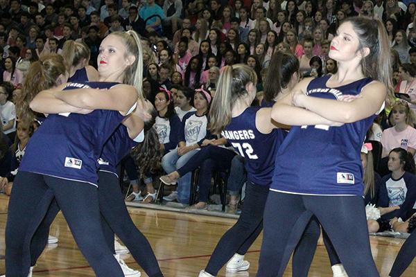 The Silver Spurs perform a hip hop routine.