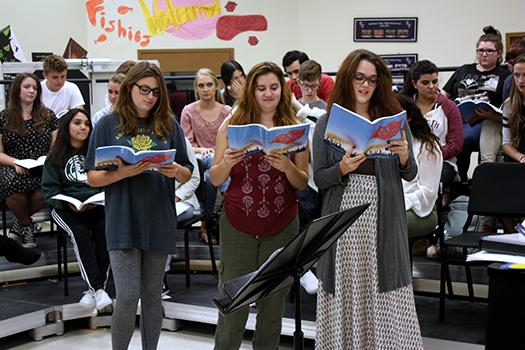 During rehearsal, choir students prepare for an upcoming performance.