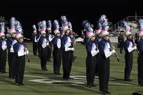 Clarinets and bass clarinets perform with the band during Friday's halftime show.