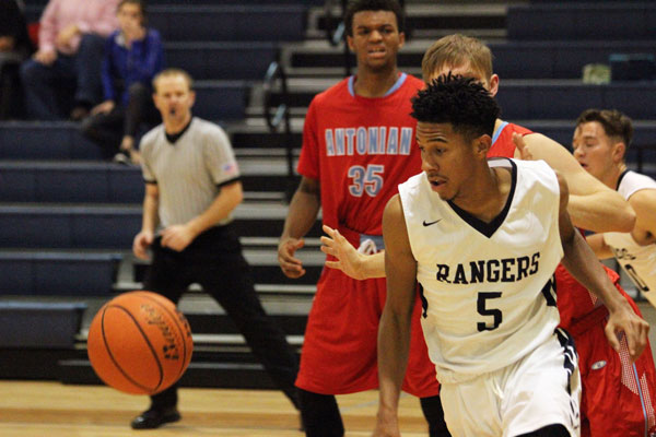 Basketball escapes with win
