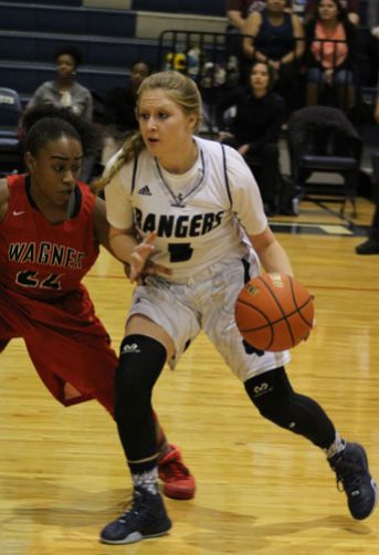 Jena Mehlbrech drives the ball down the court.