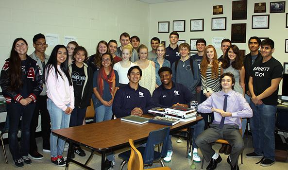 The media team gathers for a photo in the computer lab.