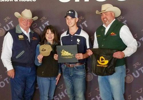 Sophomore Garrett Fischer is presented the scholarship after his win at San Antonio Rodeo.