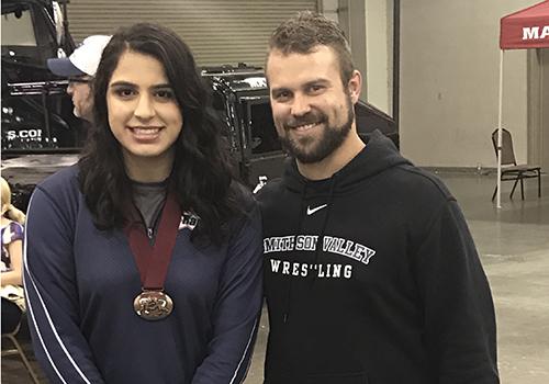 Senior All-American Ariana Mendoza and coach Brett Wandler