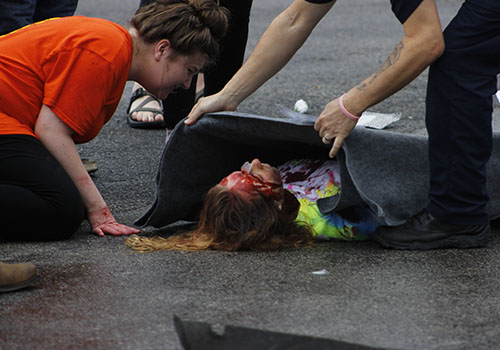 Theater student Emily Harrison bids a last farewell to accident victim Hannah Presley.