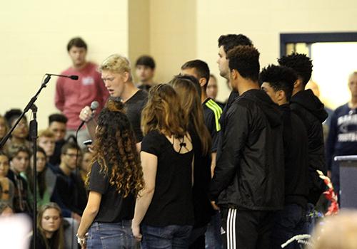 Choir performs "See you again" at mock memorial.