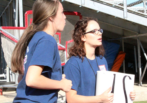 FACS volunteers ????? and Ann Mark hold the SVHS sign.