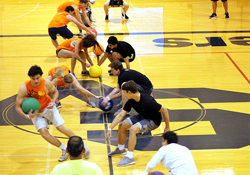 Two teams skirmish for first ball in beginning of round.
