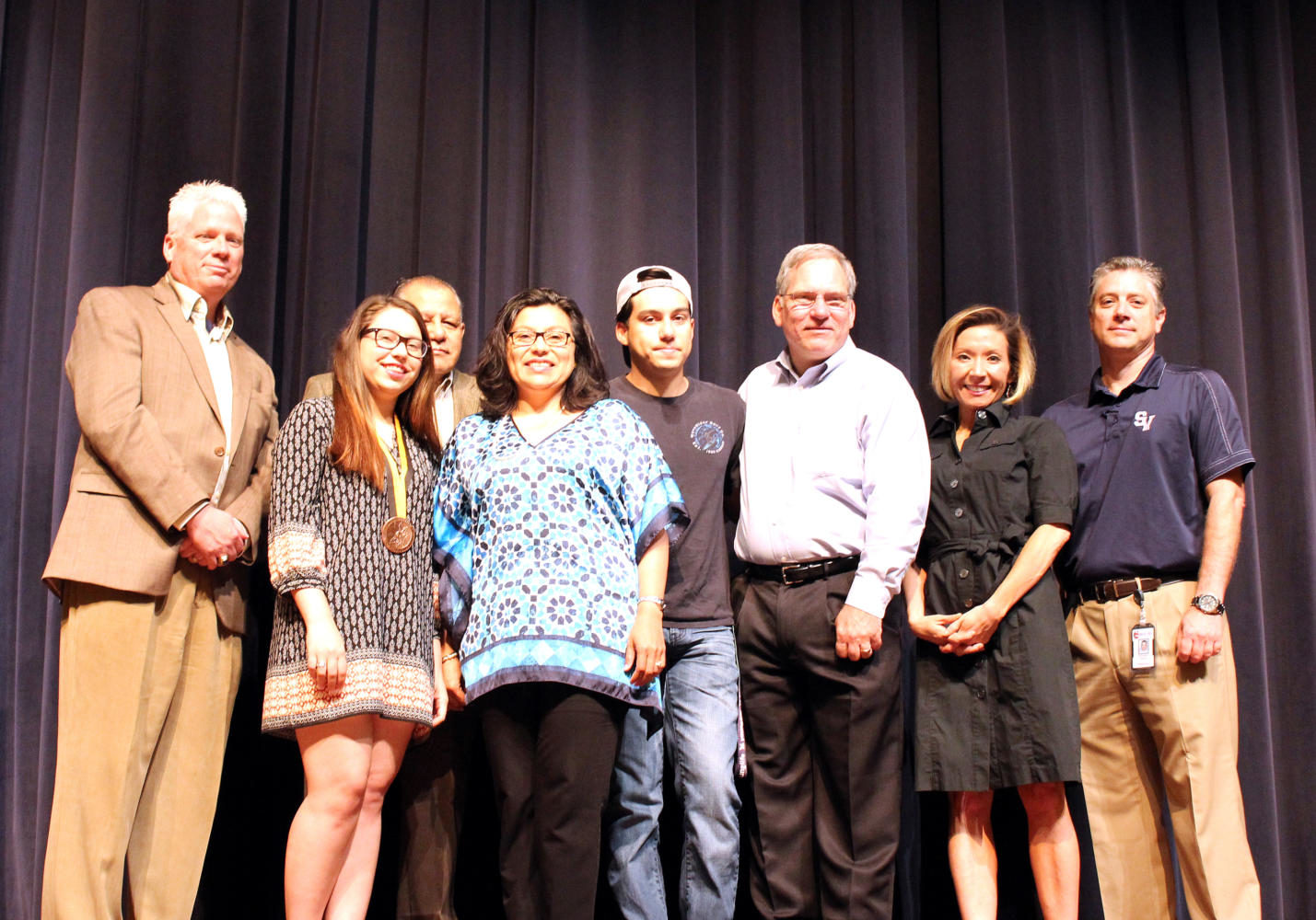Kaitlyn Ecoff and family accept Pruedential Spirit Award with Ronald Swanson, Jose Perez, Micheal Wahl, and Christine Rostedt. 