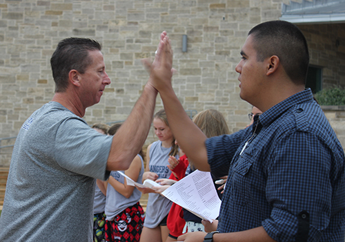 Jaime Rodriguez and Denis Rohlmeier high fiving at see you at the poles.