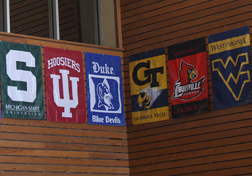 Some of the college banners hanging in the senior dining hall.