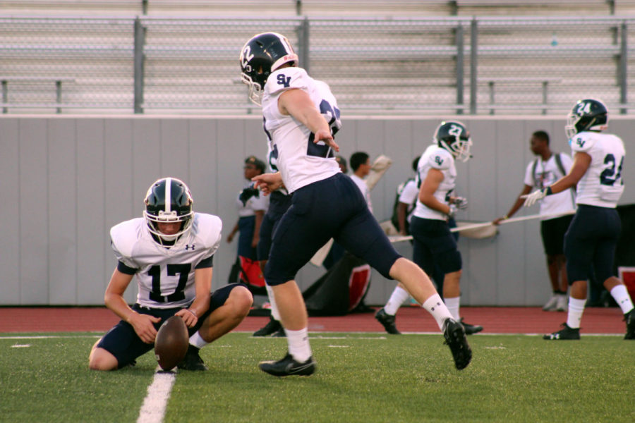 Junior kicker Mason Reid warming up against Canyon on Oct. 27