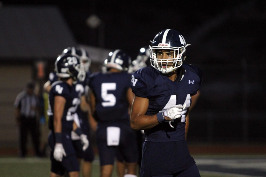 Senior standout Trevon Moehrig Woodard warming up against Clemens on Oct. 20.
