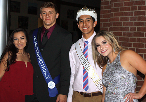 Seniors Maddie Carlson, Homecoming Prince CJ Kuehler, Homecoming King Bobby Palomin, and Homecoming Princess Macky Foley attended the Homecoming Dance on Oct 2. last year.