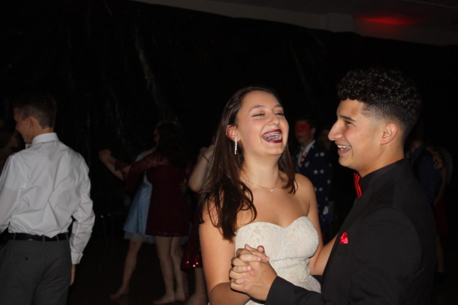Having a ball
Lynnea Seiler and Ricky Cavazos beam  with glee at homecoming.