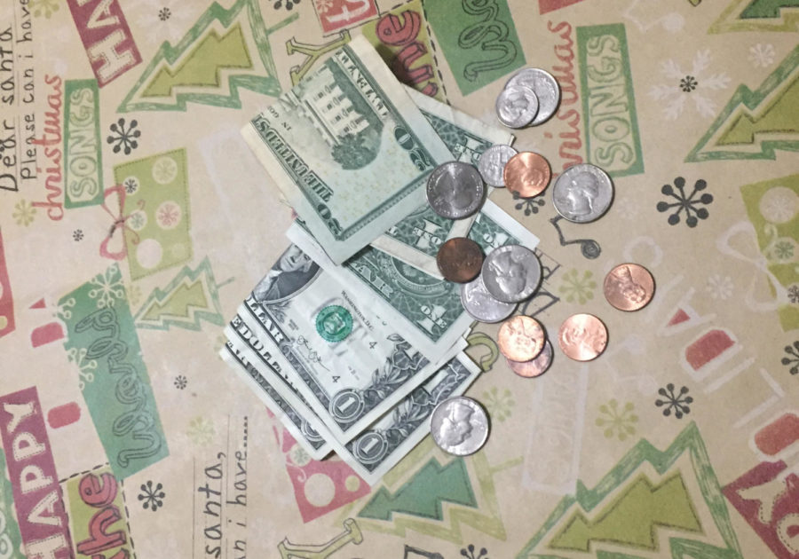 Cash
If nothing else cold hard cash is always a great gift. People often underestimate how excited people can get when they receive cash as a present. The great benefit to giving someone cash is that they then have the flexibility to get what they want. 
