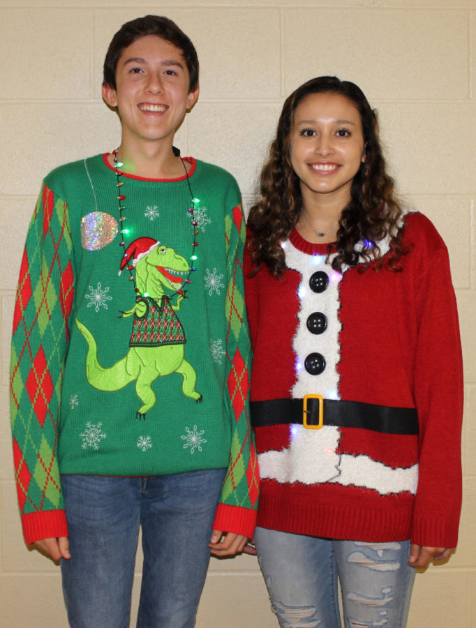 Juniors Adam Day and Ashley Adaszczyk light up B wing outside of Kirsten Watkins' room during third period.