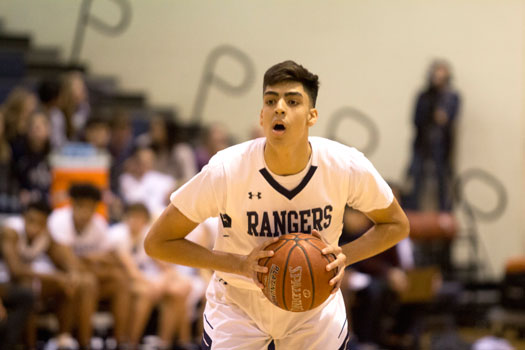 Bouncing back: Senior Alex Peavy steps into a pass from the top of the key in the teams 58-55 win over San Marcos on Dec. 15 at home. The team has dropped 7 straight since this win as they continue to face a tough district schedule.