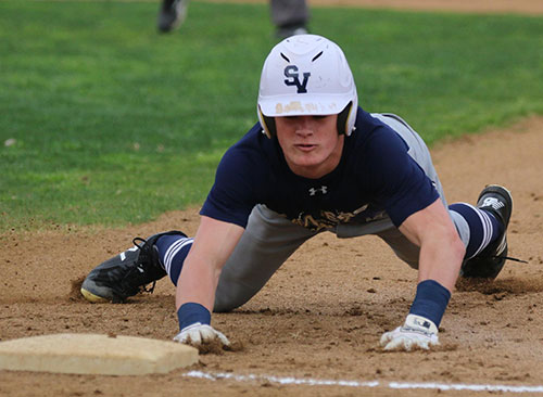 Mason Pierce slides to the bag during the teams Pflugerville tournament on Feb 22-24. The team went 3-1 in the tournament.