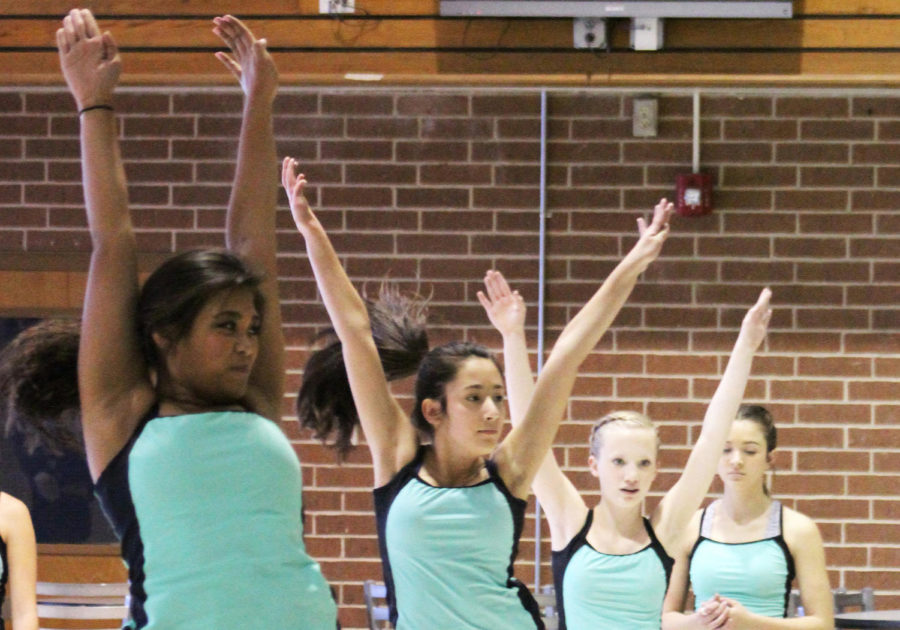 Photo of the Day: Freshmen AJ Gonzalez and Kari's Olson practice their dance routine in the senior dining hall on Jan. 9 in preparation for an upcoming competition.