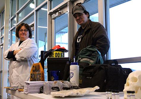 Criminal Justice teacher Jason Gonzalez and Forensics teacher Debbie Shewbridge set up a table for incoming freshman to explore what their class is all about.