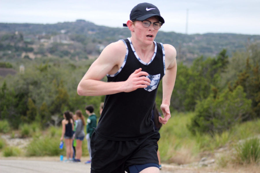 Sophomore Jacob Lacore finishing strong at the Hill Run Challenge on February 3rd to  kick off the 2018 track season.