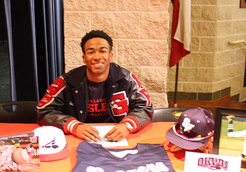 Eric Reece signs his letter to play baseball at Oklahoma West End University. The signing took place this morning. "It's a great school with a competitive Christian program and it's a good place to be," he said. 