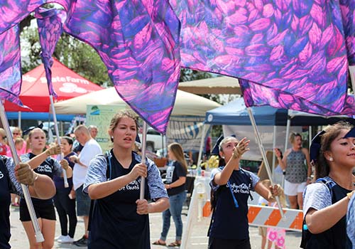 The color guard colorfully performs at the Bulverde Jubilee parade last year. 