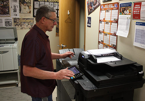 Bob Tysarczyk prepares copies for teachers on March 1.