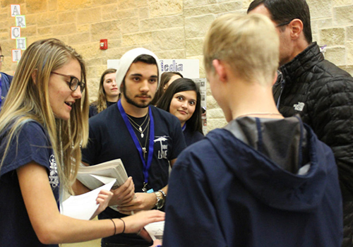 Seniors Mckenzie Bentley, Garrett O'Donnell and sophomore Grace Collazo recruit new eighth graders during the Plan 4 Your Future night at the school. Help us #makeadifference during Scholastic Journalism week by sharing news, events, sports and opinion. Stop by C105 to talk about next year. #SJW2018