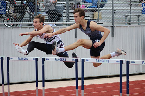 Junior Jeremiah Gilliam leaps over the hurdle during the 110M race during the Ranger Relays on March 3.