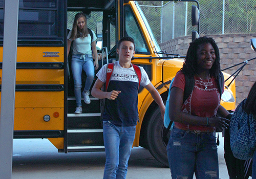 Bus riders enter the Rotunda on the first day of school, Aug. 28.