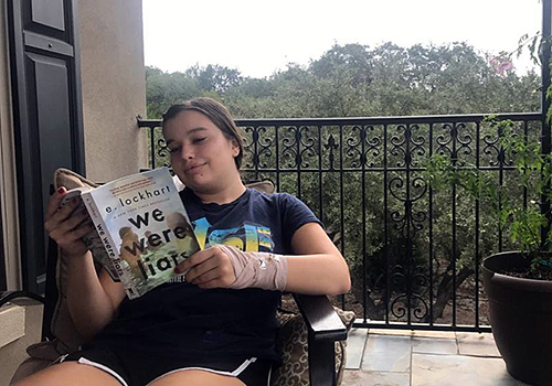 On Columbus Day, freshman Anna Vig cozies up with her favorite book "We Were Liars." Fun fact: She was born and raised in Columbus, Ohio.