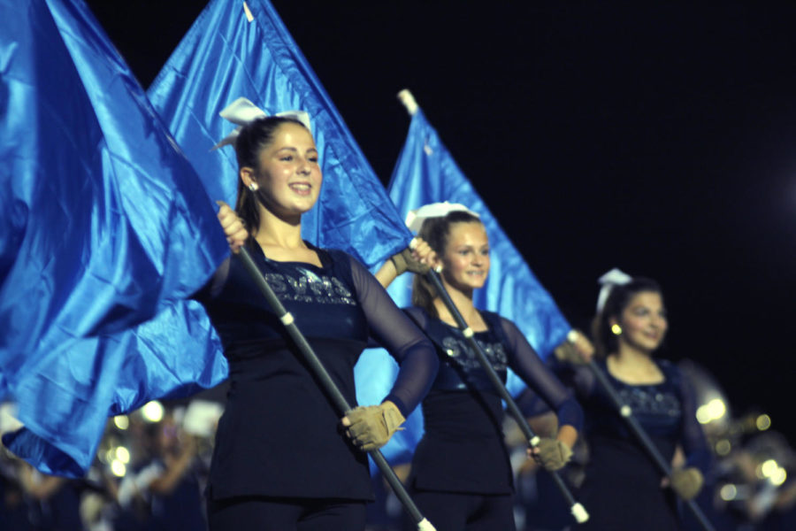 At the Judson game Oct. 29, sophomore Keely Graber, freshman Ryan Thomas and junior Kaylean Cook perform Xperiment 78070, the UIL marching show. The band performs at the area contest Saturday at 3:30 p.m.
