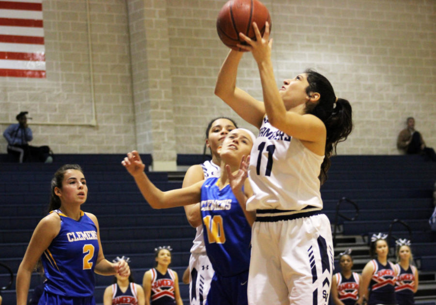Senior Alyssa Marin goes up for the layup in a game against Clemens last season.
