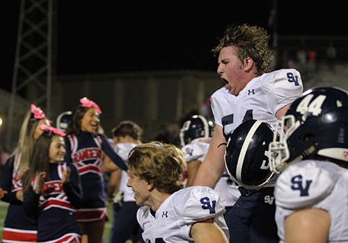 OL #54 Taylor Brooks celebrates a big win over Steele.