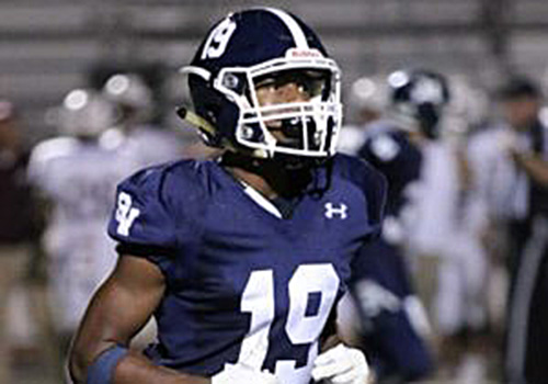 Jalen Nutt runs on the field, in hopes of winning a game.