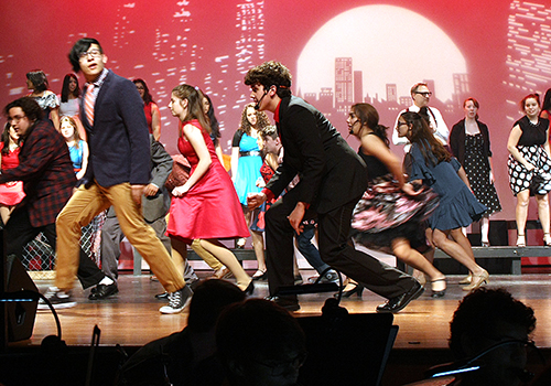 Josh Gomez (Juano) and Dylan Perez (Bernardo) dance in West Side Story, the winter musical performed Dec. 6-8 in the auditorium.