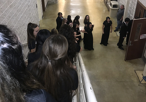 During the holiday concert Monday in SVHS Auditorium, choir members line the steps down into the foyer as they wait for their chance to perform. The concert featured a Hallelujah Chorus at the end.