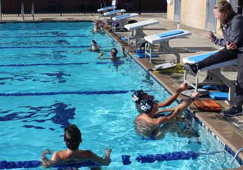 The varsity swim team heads into state this Friday and Saturday in Austin.