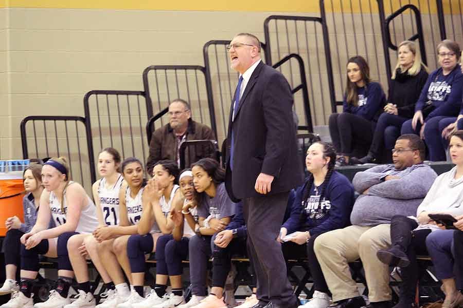 Coach David Farber calls in plays as the girls take the lead in the first quarter on Feb. 11th at Canyon Lake high school.