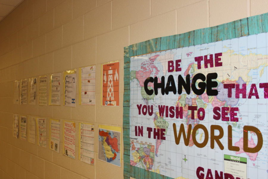 Outside Jonathan McKinley's classroom products from his geography students taped on display reveal poems about South West Asia. 