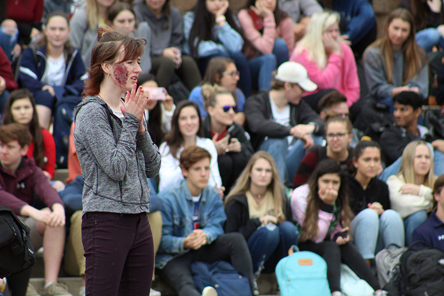 A distressed Rachel Walton watches over the scene of the accident.