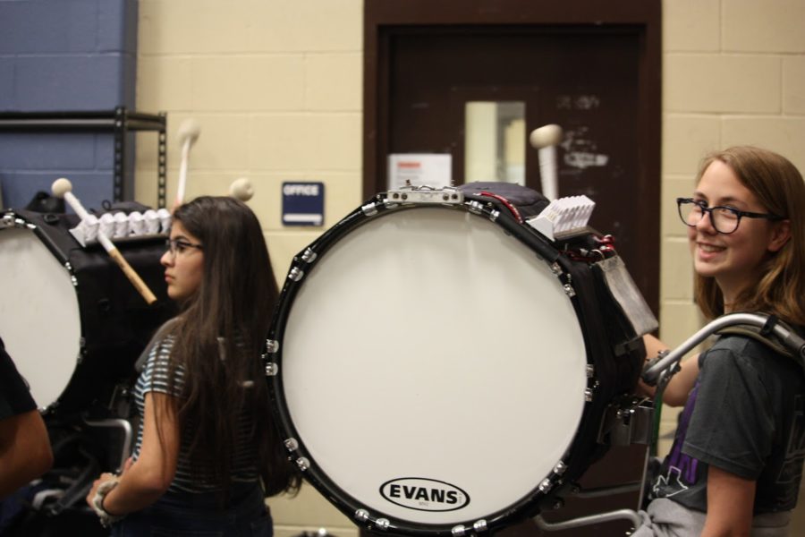 Sophomore percussionists Anne Marie Williams and Caitlyn Hermesch prepare for the show.