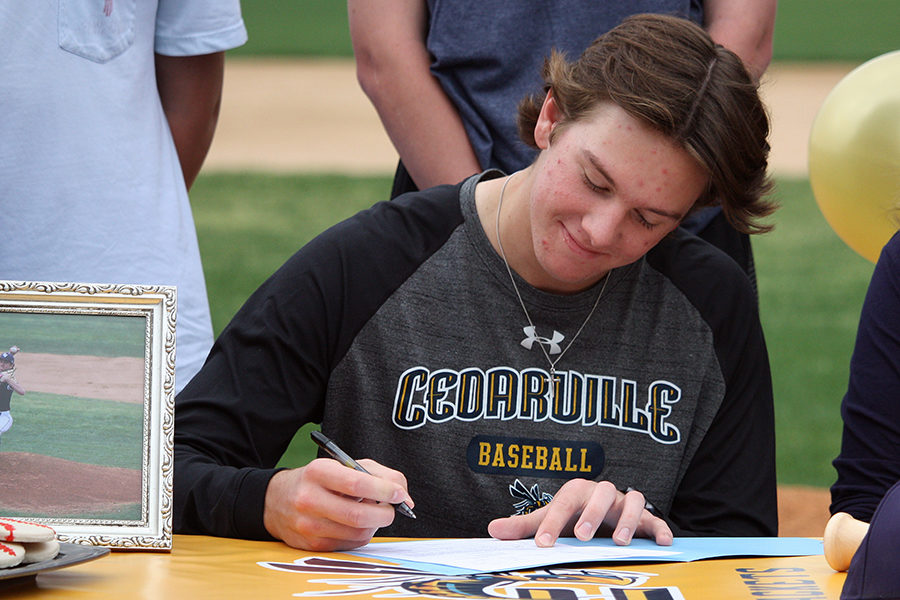 With his signature, senior Colton Eilers commits to play baseball at Cedarville University in Ohio.