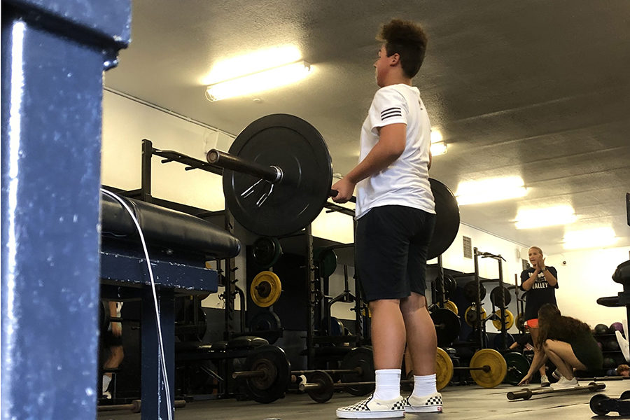 WEIGHT FOR IT - Student athletes hit the weight room during fourth period.  